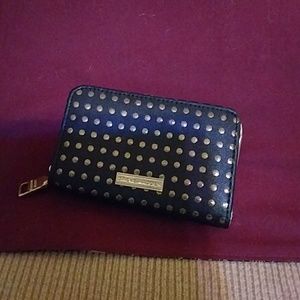 Hip med size wallet, fits in just about any purse